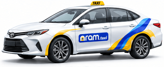 White Aram Drop Taxi sedan in the brand's blue and yellow livery